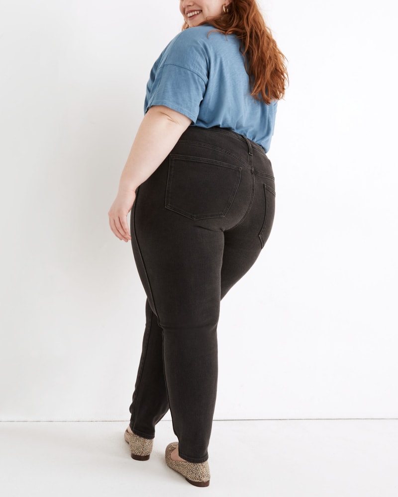 Plus size model wearing High-Rise Skinny Jeans in Starkey Wash by Madewell | Dia&Co | dia_product_style_image_id:168053